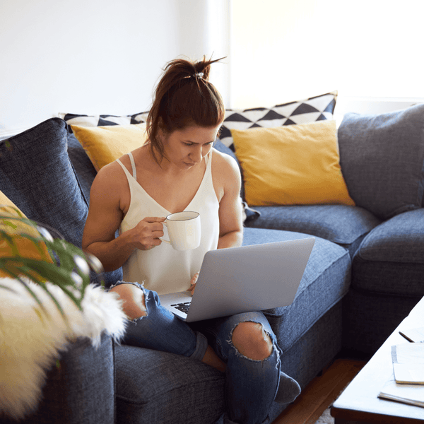 Woman reviewing fertility information at home after receiving a low AMH result