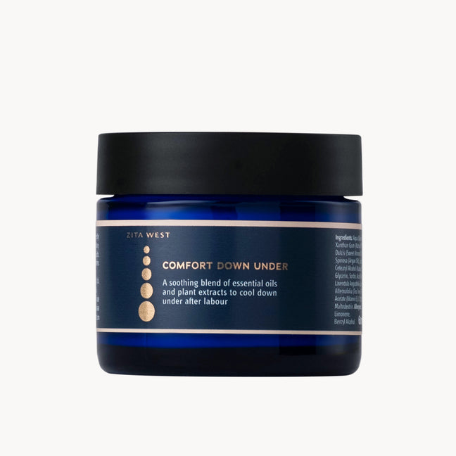 Blue jar with black lid labeled 'Comfort Down Under' on a white background