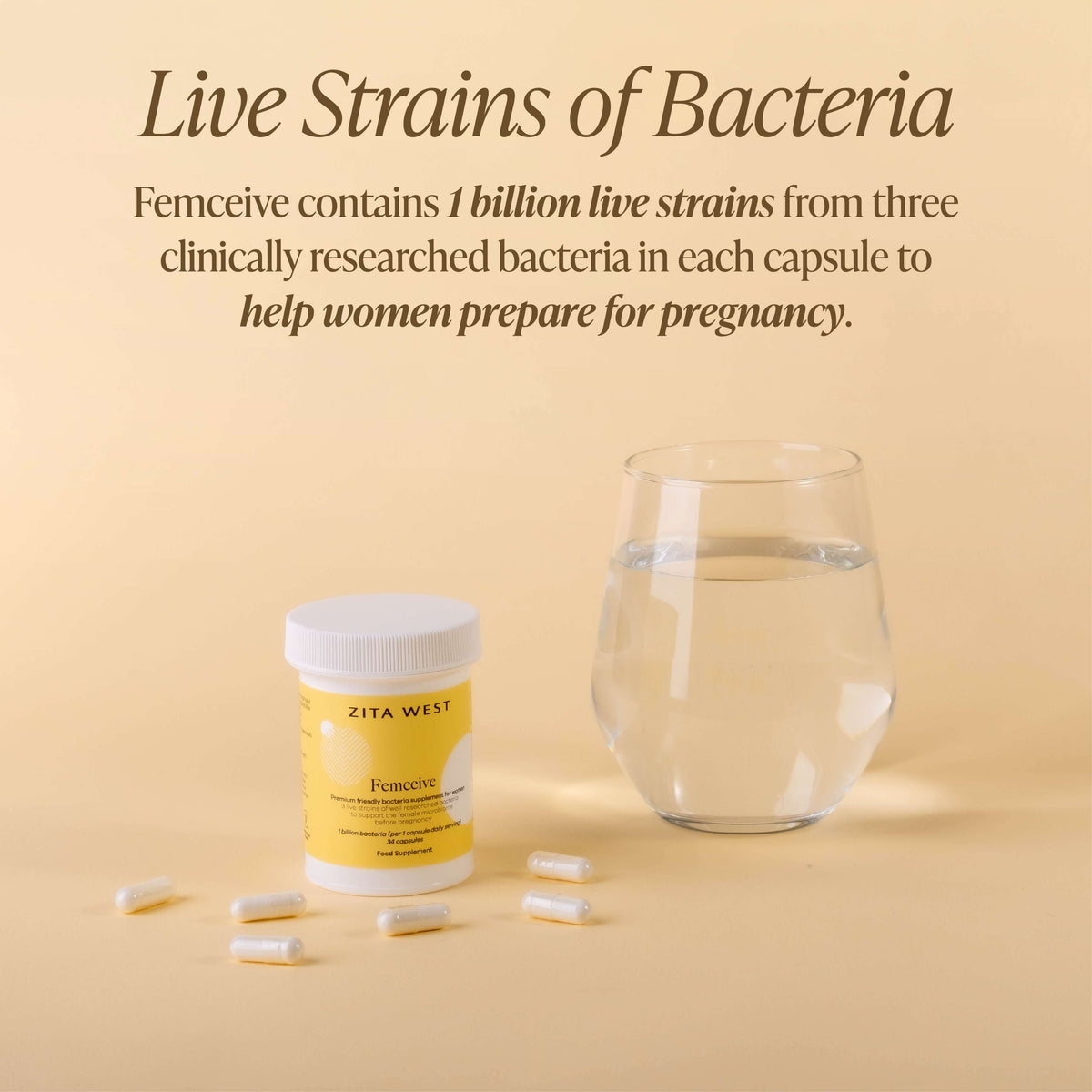 Zita West Femceive and capsules next to a glass of water