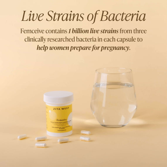 Zita West Femceive and capsules next to a glass of water