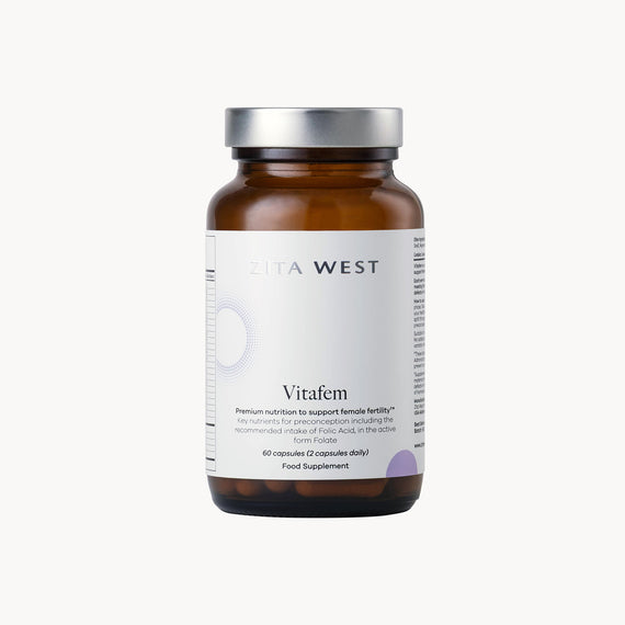 Vitafem supplement bottle with a white label on a white background