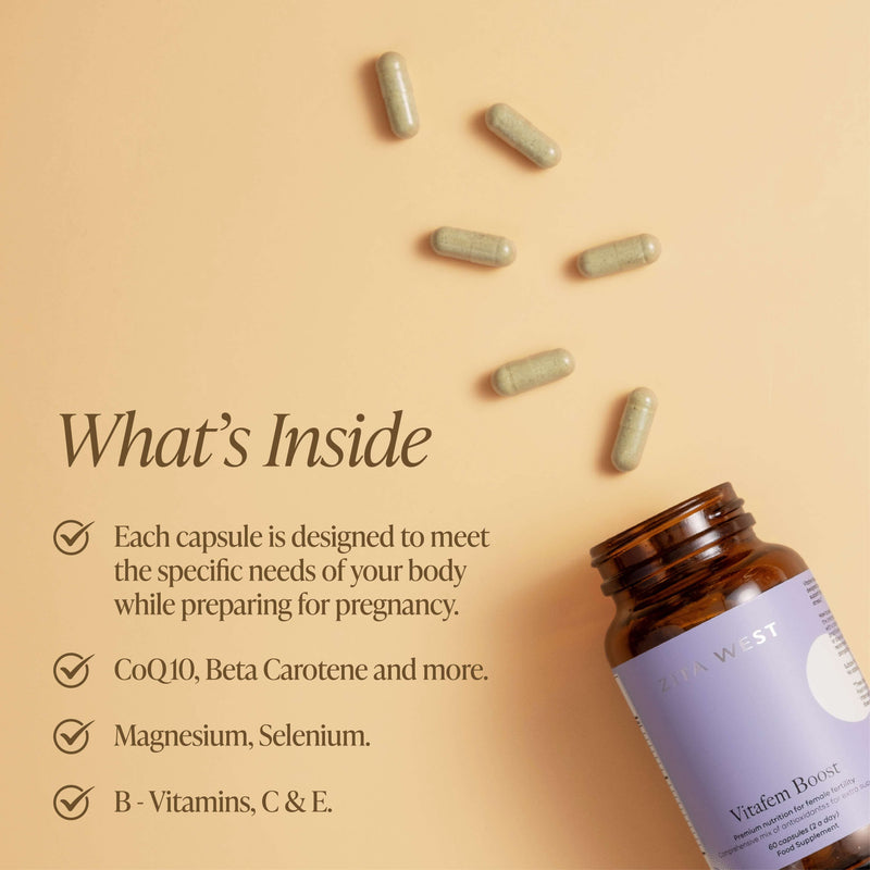An open bottle of Vitafem Boost with capsules scattered on a yellow background