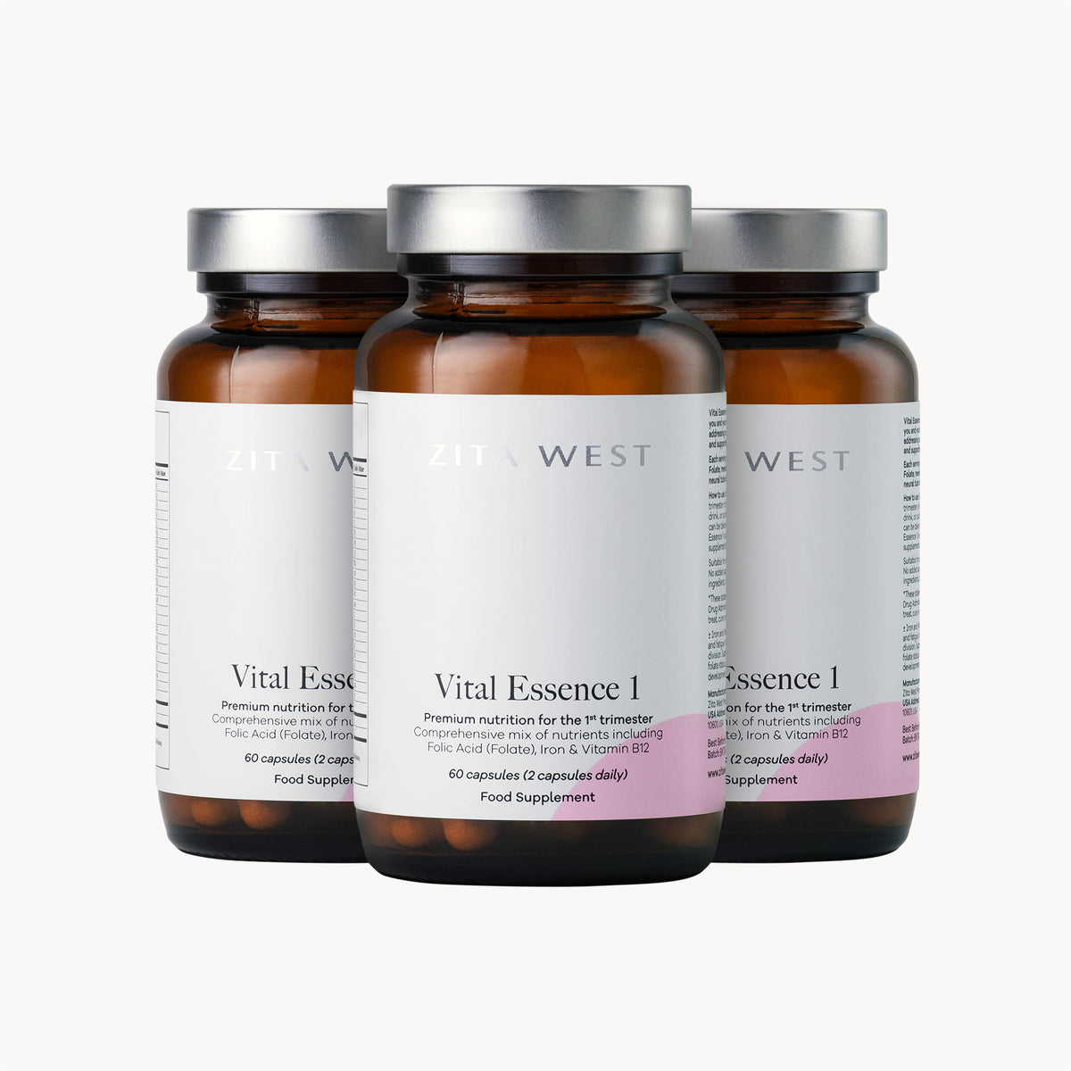 Three bottles of Zita West 'Vital Essence 1' on a white background