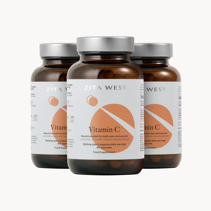 Three bottles of Zita West Vitamin C supplements on a white background